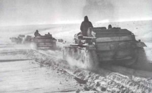 Durch die Schneefelder der Donezfront bei Charkow bahnen sich StuG III Sturmgeschütze den Weg 